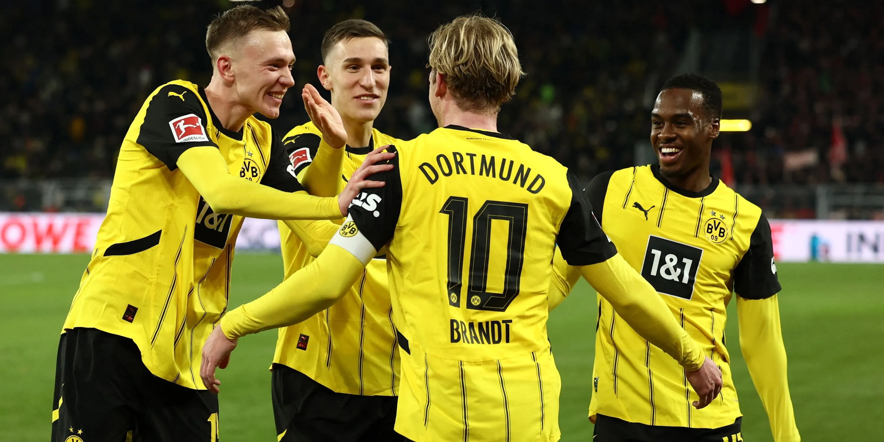 borussia dortmund s julian brandt celebrates scoring their third goal with jamie bynoe gittens and teammates